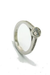 18ct White Gold 0.20ct Rubbed in Set Diamond Engagement Ring