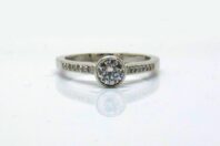 18ct White Gold 0.20ct Rubbed in Set Diamond Engagement Ring