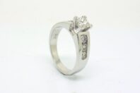 18ct White Gold 0.70ct Princess Cut Diamond with a Fancy Pierecd Out Back.