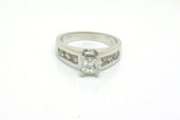 18ct White Gold 0.70ct Princess Cut Diamond with a Fancy Pierecd Out Back.