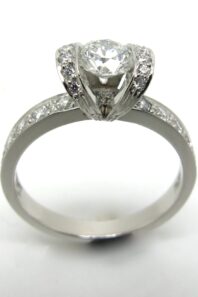 0.80ct Round Brillliant Cut Diamond in a Ribbon style Platinum Mount