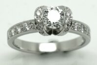 0.80ct Round Brillliant Cut Diamond in a Ribbon style Platinum Mount